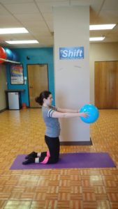 Young woman doing exercises at SHIFT Minneapolis studio
