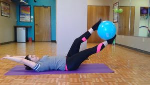 Young woman doing exercises at SHIFT Minneapolis studio
