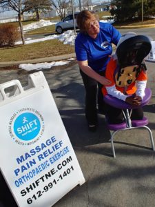 tammy giving massage at outdoor event