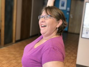 Tammy holding a pose at Minneapolis fitness studio