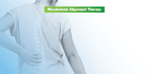 Woman holding lower back, indicating pain or discomfort - "myoskeletal alignment therapy" text header