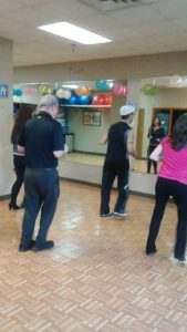 adults taking dance class at Shift Fitness & Massage's Northeast Minneapolis fitness studio