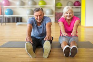 mature couple doing fitness exercises