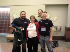 Chair massage attendees wearing funny costumes