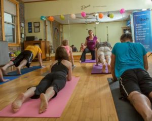 Tammy instructing a yoga class